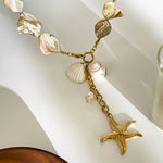 Colar elegante com pendente estrela-do-mar em pérolas
