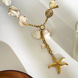 Colar elegante com pendente estrela-do-mar em pérolas