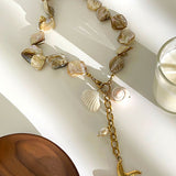 Colar elegante com pendente estrela-do-mar em pérolas