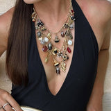 Colar vintage com pendente de várias camadas e formato irregular