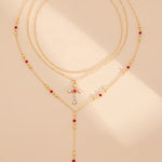 Colar elegante de várias camadas com corrente cruzada e diamantes